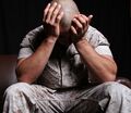 A person practicing yoga as a method to cope with PTSD.
