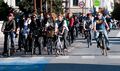 Cyclists waiting at a red light