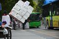 Man carrying polystyrene boxes in Guiyang, China