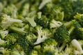 Broccoli, a green vegetable with a tree-like structure.