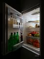 Open Refrigerator with Food at Night