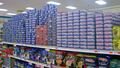 Canned Tuna – A display of canned and packaged tuna products on supermarket shelves, a convenient and long-lasting option for consumers.