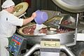 Traditional Russian sausage making – showcasing the preparation of sausages in a domestic or rural setting.