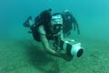 US Navy Explosive Ordnance Disposal Technician training with hand held sonar