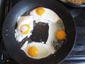 Four fried eggs