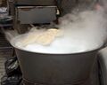 Steaming bread in Xi'an's Muslim Quarter