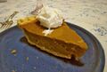 Pumpkin pie with Cool Whip on top