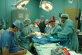 Medical staff performing cleft lip surgery