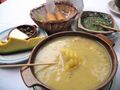 Ajiaco served in a traditional bowl