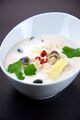 Tom kha kai with herbs and spices
