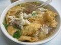 Chinese-style geng with meat, fish cakes, and squid